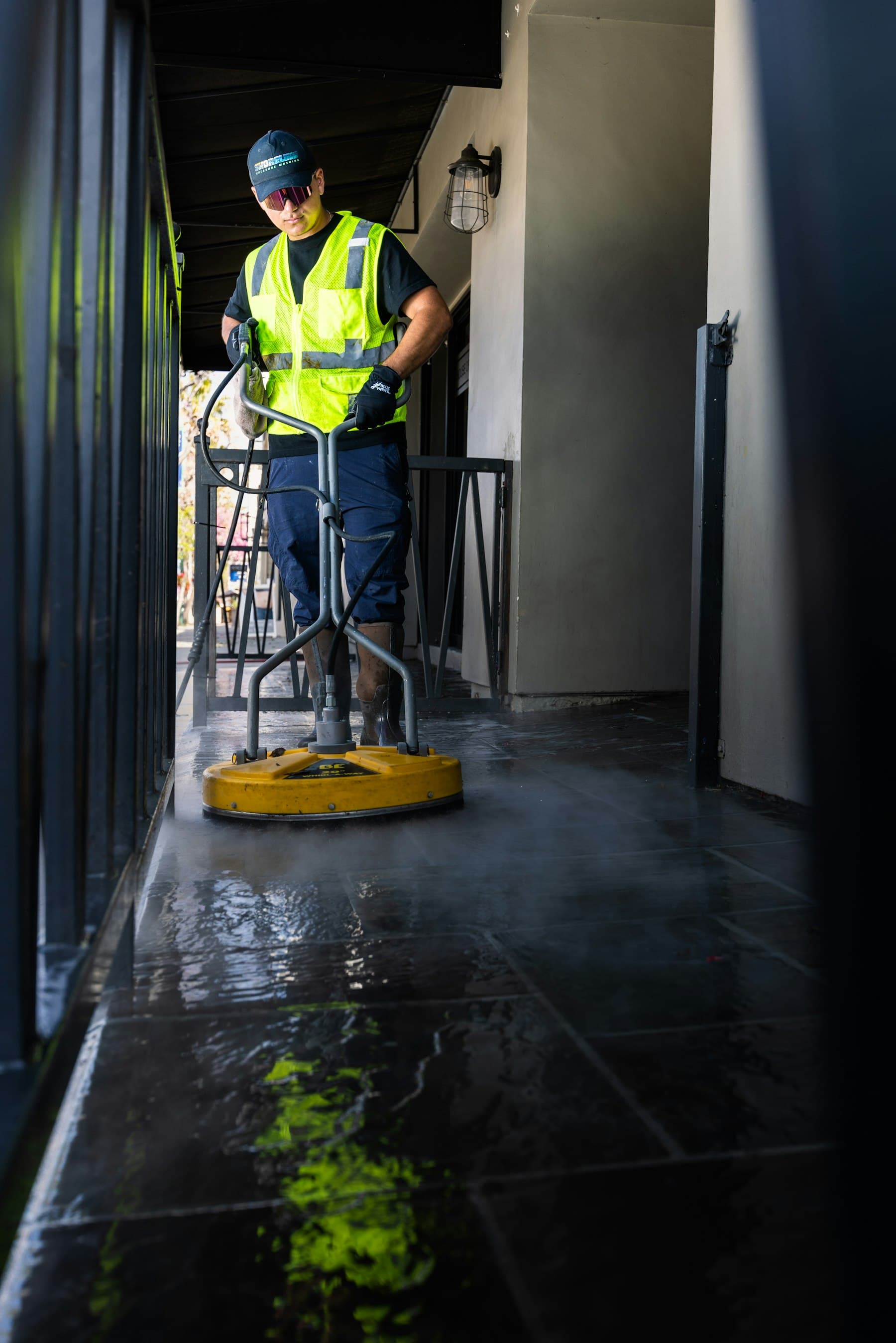 Hard floor being cleaned with a surface cleaner
